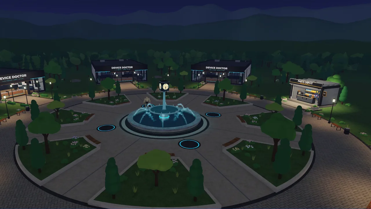 Aerial view of the plaza at night with lit shops